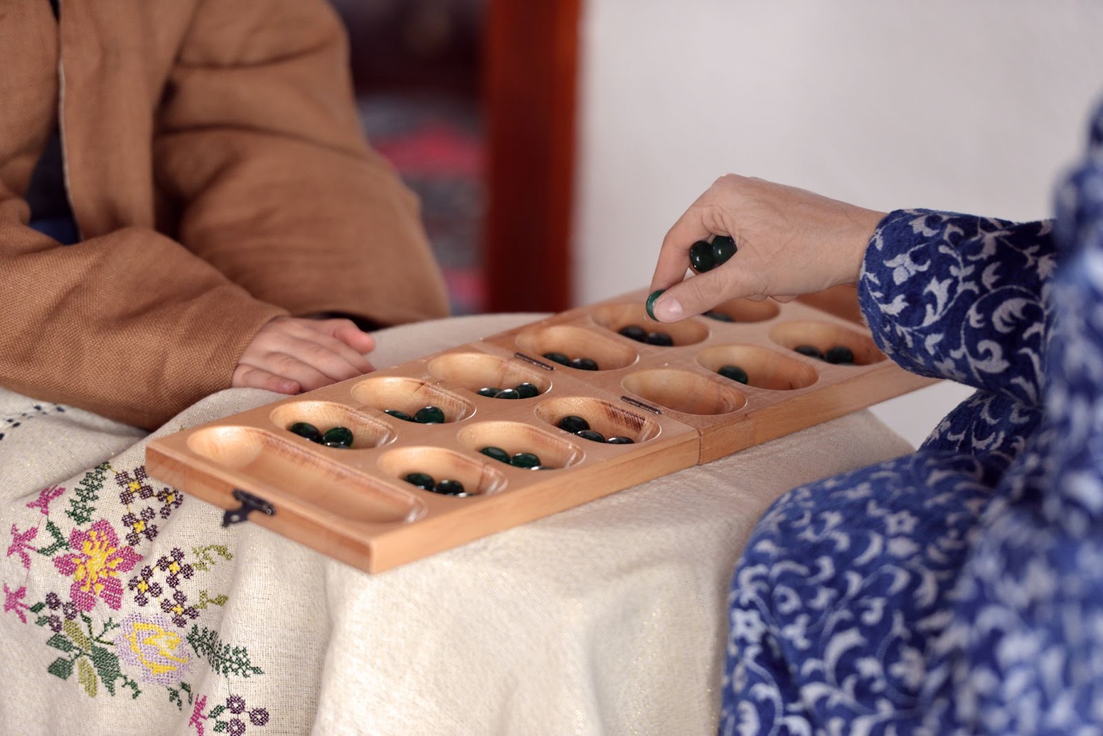 Geleneksel Zekâ ve Strateji Oyunu- Togyzqumalaq, Toguz Korgool, Mangala:Göçürme